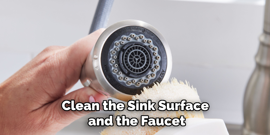 Clean the Sink Surface
and the Faucet
