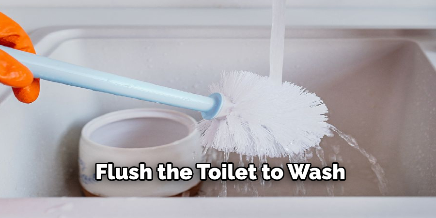  Flush the toilet to wash