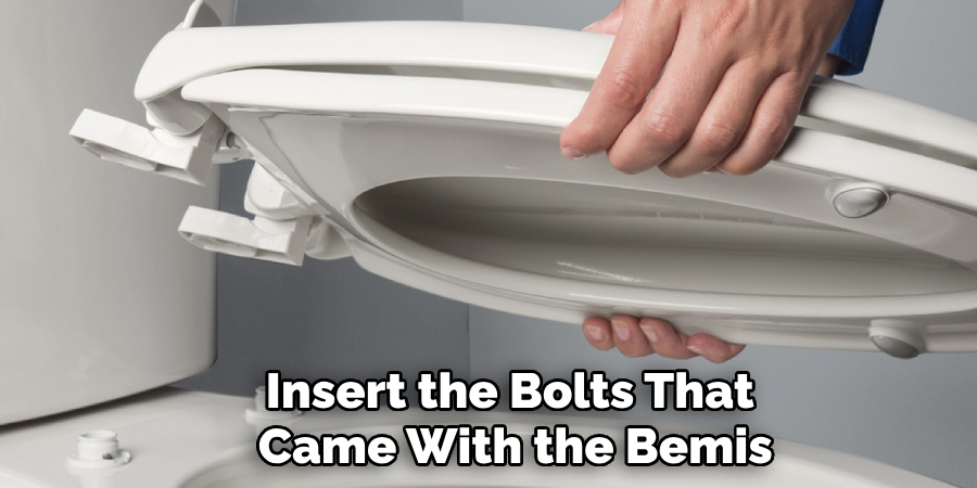 Insert the Bolts That Came With the Bemis