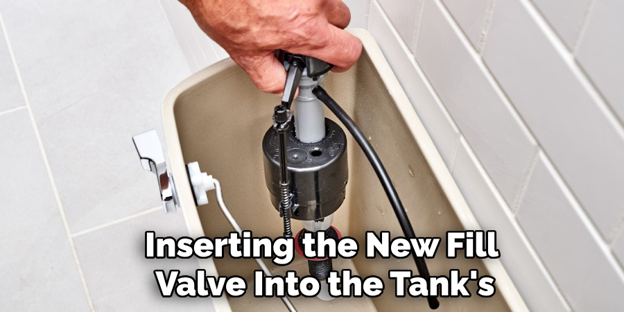 Inserting the New Fill 
Valve Into the Tank's