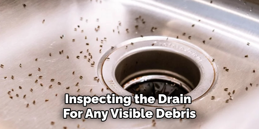 Inspecting the Drain 
For Any Visible Debris
