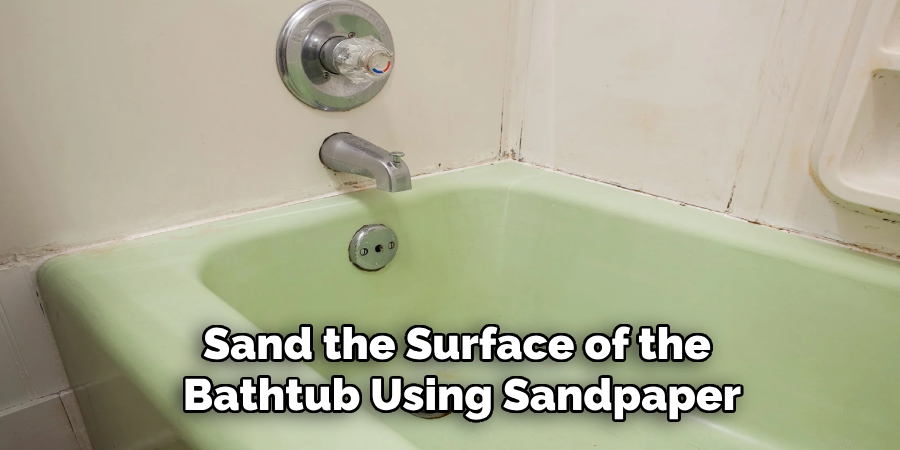 Sand the Surface of the
Bathtub Using Sandpaper