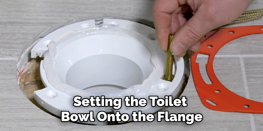 Setting the Toilet 
Bowl Onto the Flange
