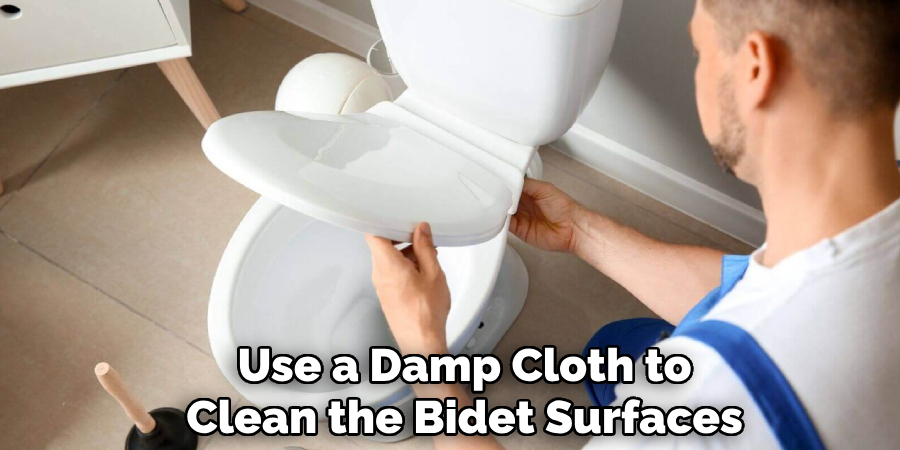  Use a Damp Cloth to Clean the Bidet Surfaces