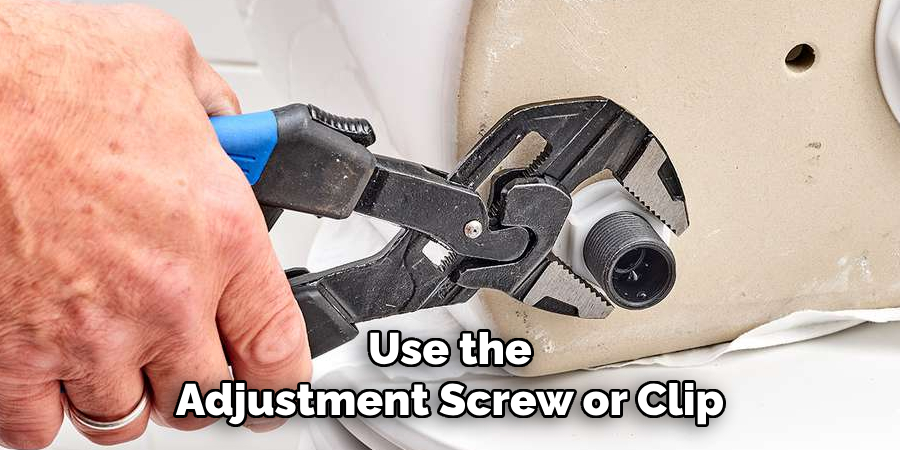 Use the Adjustment Screw or Clip