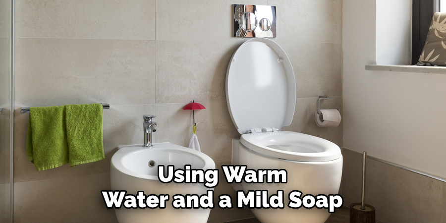 Using Warm Water and a Mild Soap