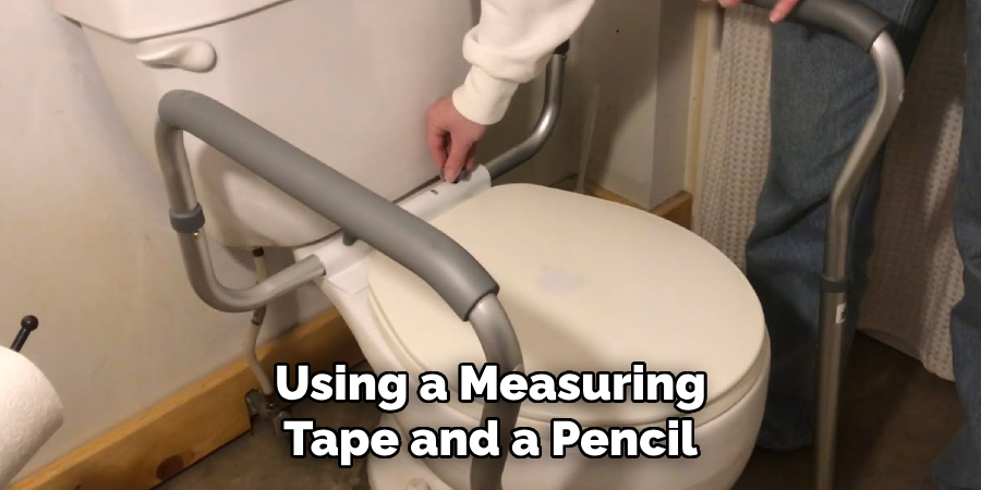Using a measuring tape and a pencil