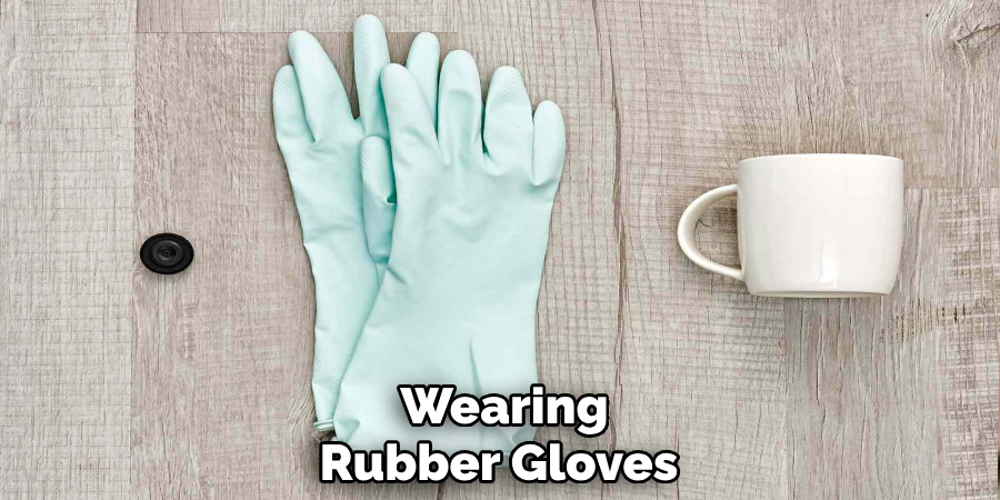 Wearing
Rubber Gloves