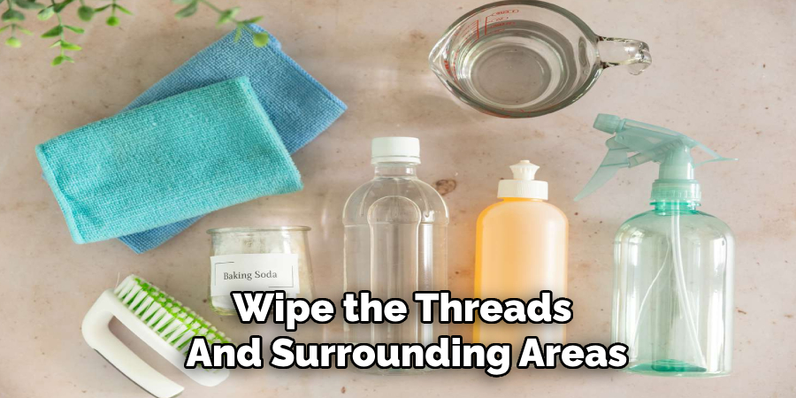 Wipe the Threads 
And Surrounding Areas