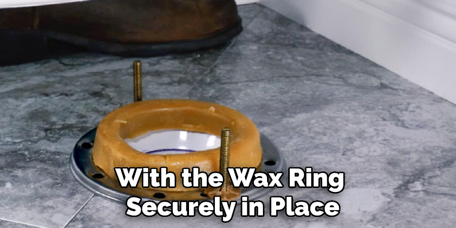 With the Wax Ring 
Securely in Place