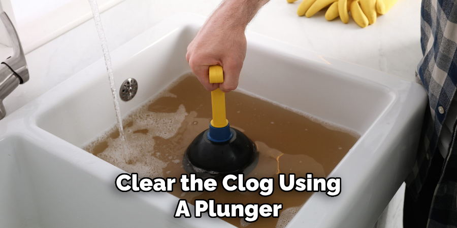 Clear the Clog Using
A Plunger