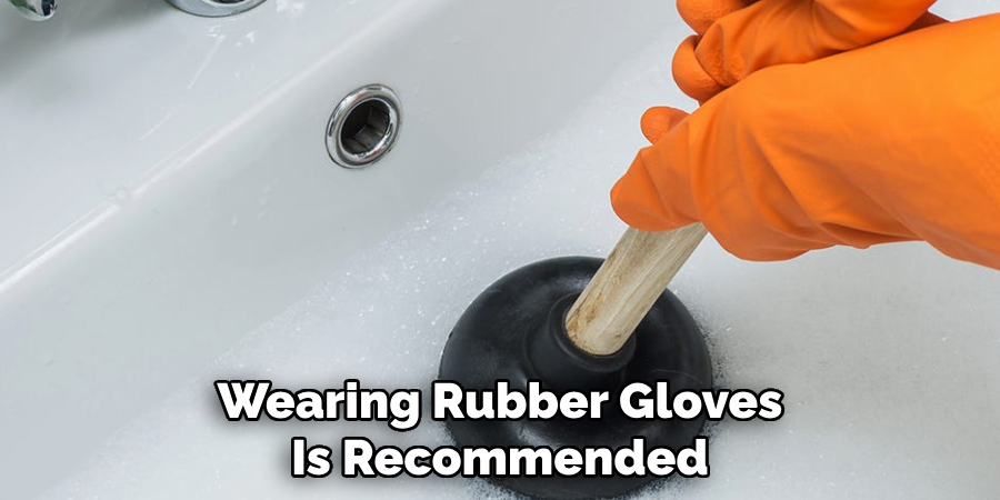 Wearing Rubber Gloves
Is Recommended