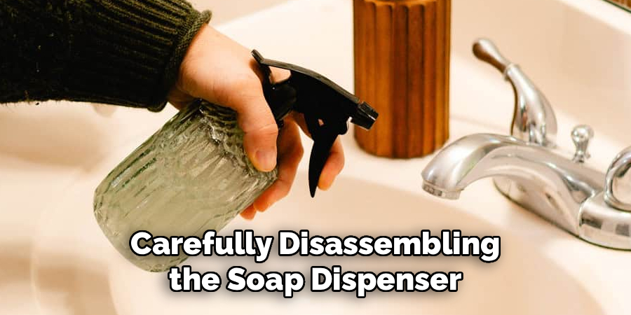 Carefully Disassembling the Soap Dispenser