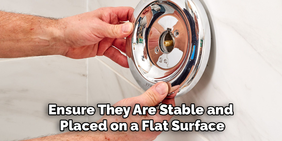 Ensure They Are Stable and 
Placed on a Flat Surface