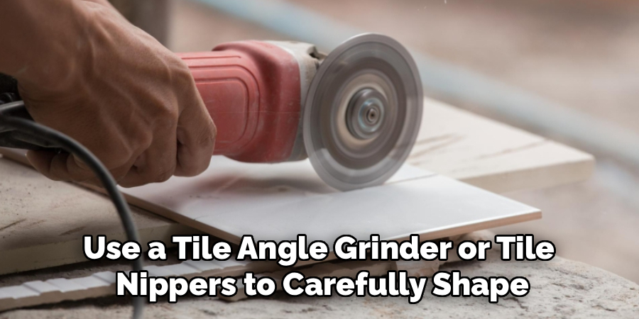 Use a Tile Angle Grinder or Tile 
Nippers to Carefully Shape